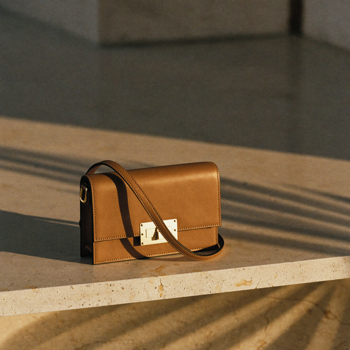 Tan leather crossbody bag